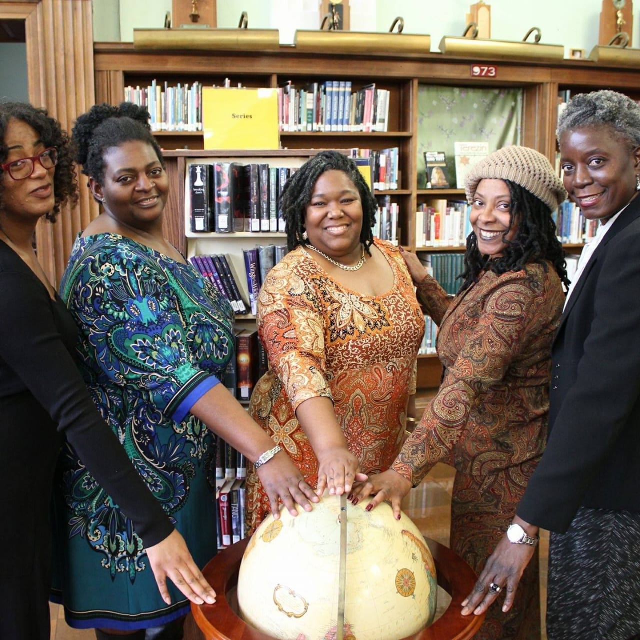Diverse group of elegant women in community together